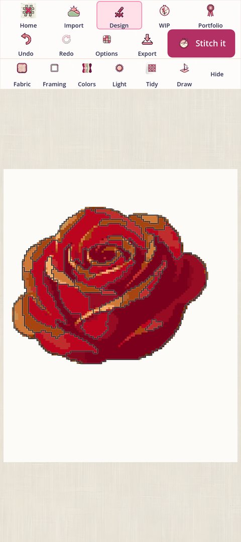 The same rose after Around every color: black backstitch along every boundary between two threads, so each petal and each highlight is its own outlined area