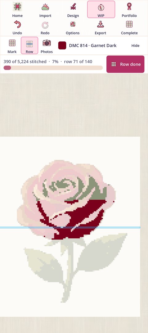 Row armed mid-stitching with DMC 814 Garnet Dark in the needle: a blue band across row 71 of the rose chart, the progress line reading 390 of 5,224 stitched, 7%, row 71 of 140, and a pink Row done button beside it
