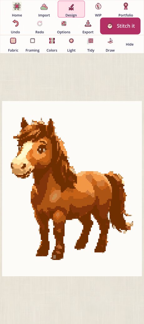 The app showing a chart of a chestnut horse on cream cloth, with the design controls above it: Fabric, Framing, Colors, Light, Tidy and Draw